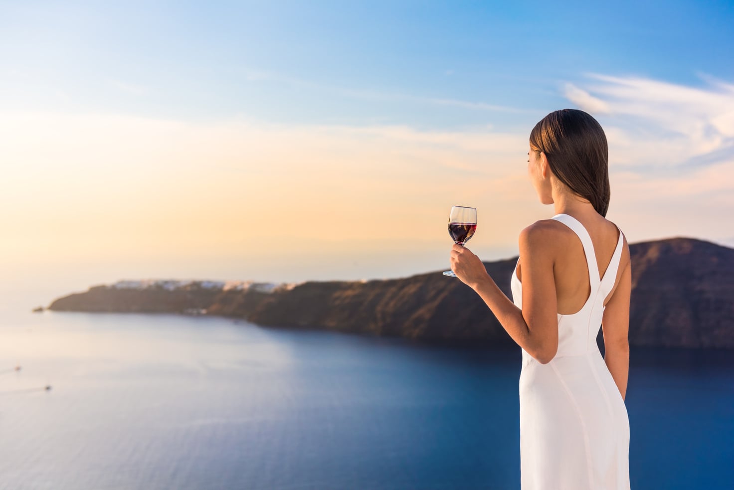 Woman Drinking Red Wine on Luxury Terrace